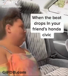 A Woman Is Sleeping In The Back Seat Of A Honda Civic GIF