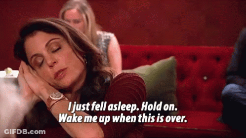 A Woman Is Sleeping On A Red Couch And Saying " I Just Fell Asleep Hold On Wake Me Up When This Is Over GIF