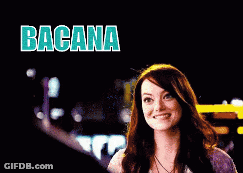 A Woman Is Smiling And Giving A Thumbs Up In Front Of A Sign That Says Bacana GIF