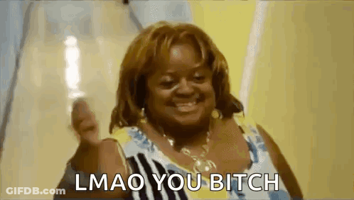 A Woman Is Smiling And Giving A Thumbs Up With The Words `` Lmao You Bitch '' Written Below Her . GIF