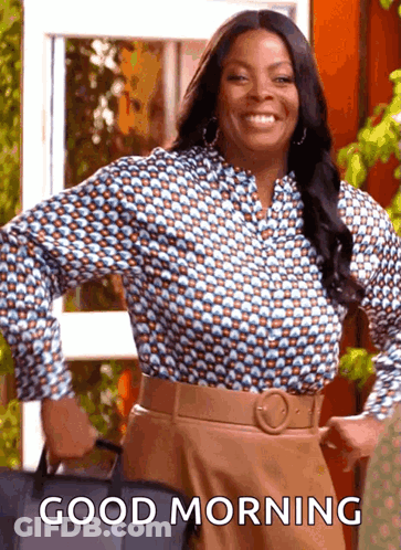 A Woman Is Smiling And Holding A Bag With The Words Good Morning Written On It GIF