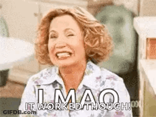 A Woman Is Smiling And Laughing With The Words `` It Worked Though '' Written Below Her . GIF