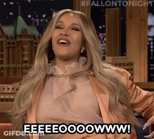 A Woman Is Smiling And Saying Eeeeooowww . GIF