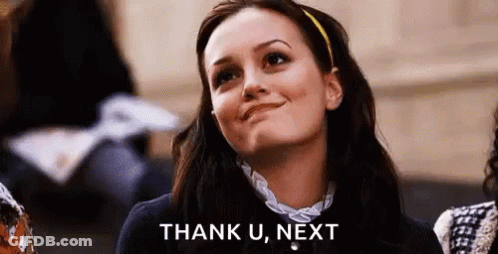 A Woman Is Smiling And Saying `` Thank U , Next '' While Looking Up . GIF