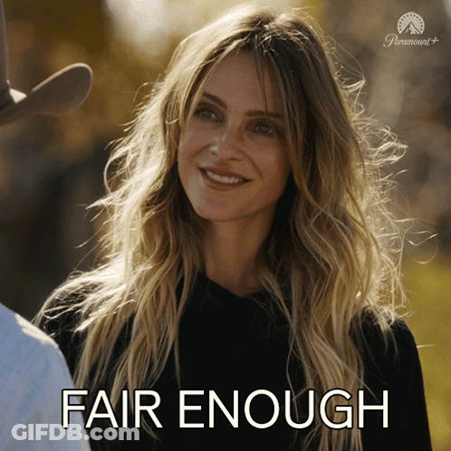 A Woman Is Smiling And Says Fair Enough GIF