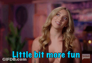 A Woman Is Smiling And Says Little Bit More Fun Bravo GIF
