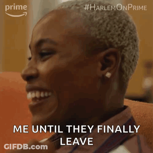 A Woman Is Smiling And Says Me Until They Finally Leave . GIF