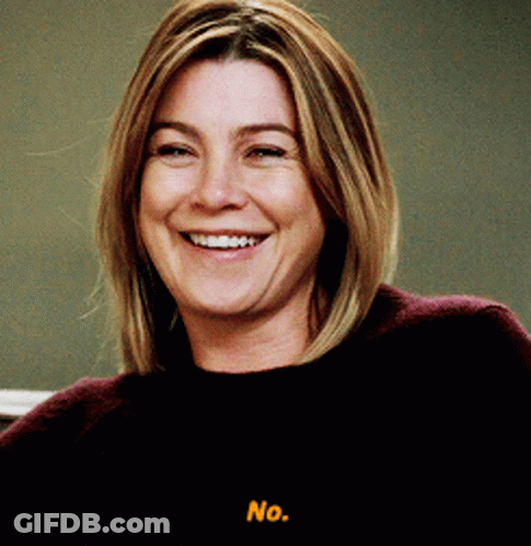 A Woman Is Smiling And Says No In Yellow GIF