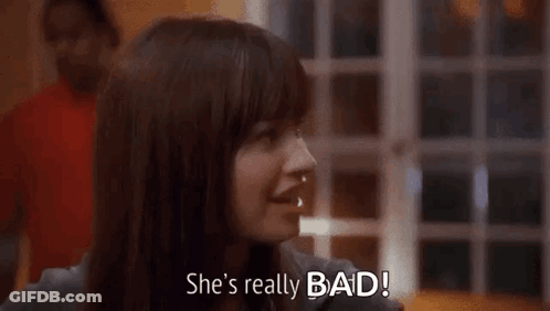 A Woman Is Smiling And Says `` She 'S Really Bad '' . GIF