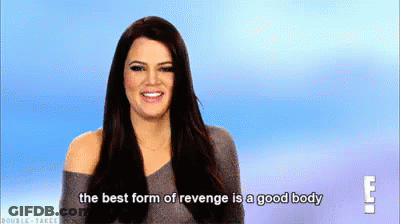 A Woman Is Smiling And Talking About Revenge . GIF