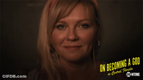 A Woman Is Smiling In A Showtime Ad For On Becoming A God In Central Florida GIF