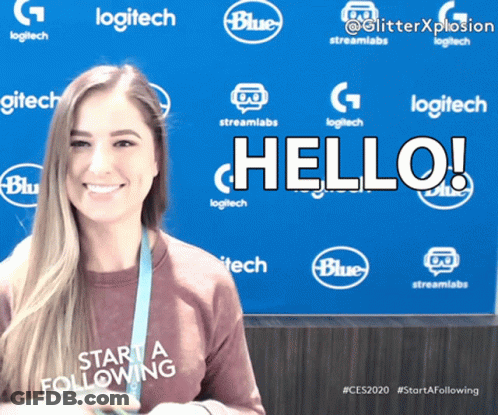 A Woman Is Smiling In Front Of A Blue Background That Says Logitech GIF