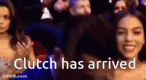 A Woman Is Smiling In Front Of A Crowd With The Words " Clutch Has Arrived " GIF