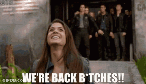 Woman Smiling And Saying We're Back Bitches GIF