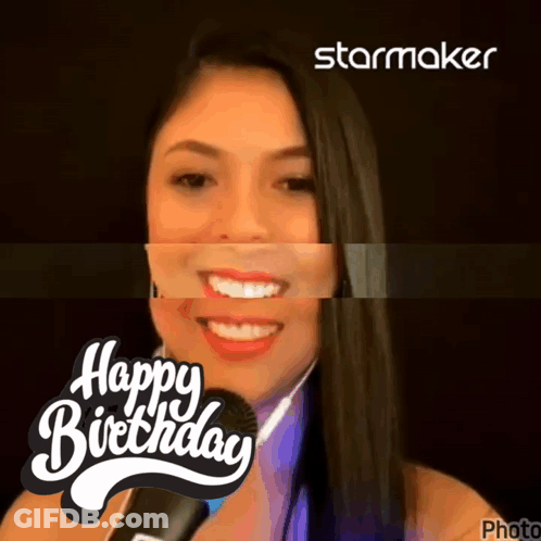 A Woman Is Smiling In Front Of A Microphone With The Words Happy Birthday Behind Her GIF