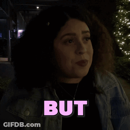 A Woman Is Smiling In Front Of A Poster That Says Content GIF