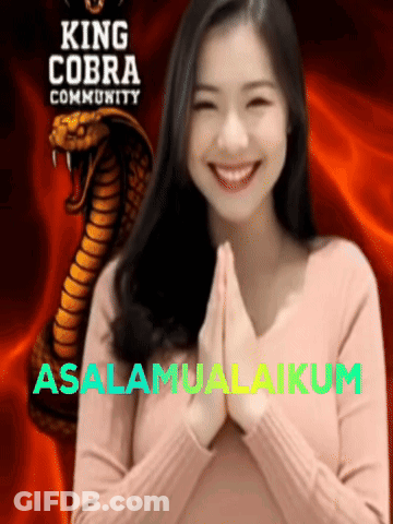 A Woman Is Smiling In Front Of King Cobra Community GIF