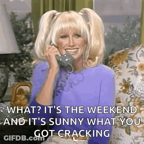 A Woman Is Smiling While Talking On A Phone And Says What It 'S The Weekend And It 'S Sunny GIF
