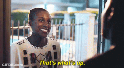 A Woman Is Smiling While Talking To A Man And Says `` That 'S What 'S Up . '' GIF