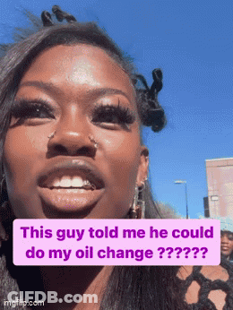 A Woman Is Smiling With A Caption That Says " This Guy Told Me He Could Do My Oil Change ?? " GIF
