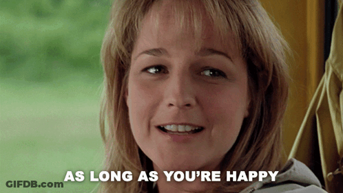 A Woman Is Smiling With The Words " As Long As You 'Re Happy " Next To Her GIF
