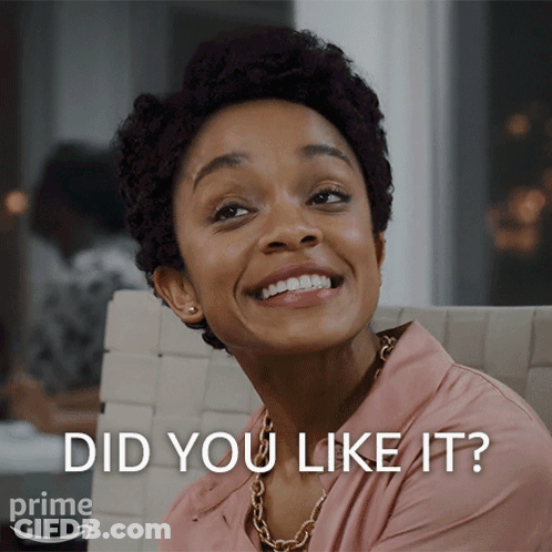 A Woman Is Smiling With The Words " Did You Like It " Behind Her GIF
