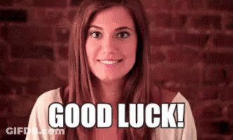 A Woman Is Smiling With The Words `` Good Luck '' Written On Her Face . GIF