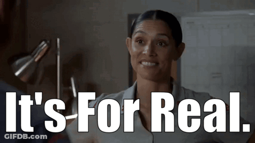 A Woman Is Smiling With The Words It 'S For Real Written Below Her GIF