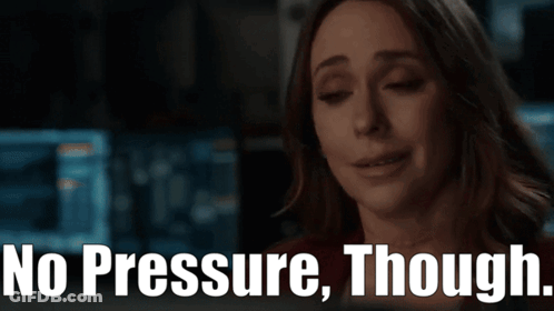 A Woman Is Smiling With The Words No Pressure Though Behind Her GIF