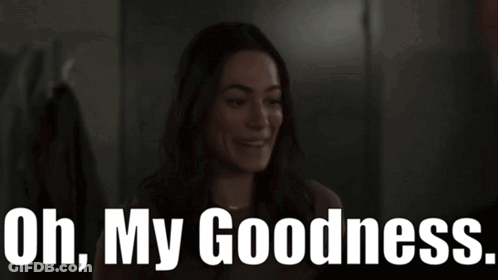 A Woman Is Smiling With The Words Oh My Goodness Below Her GIF