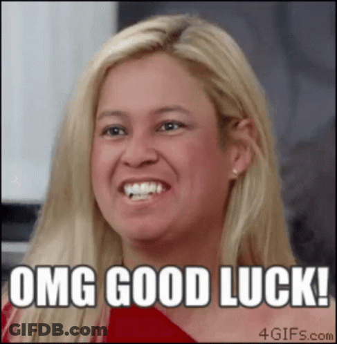 A Woman Is Smiling With The Words " Omg Good Luck " On Her Face GIF