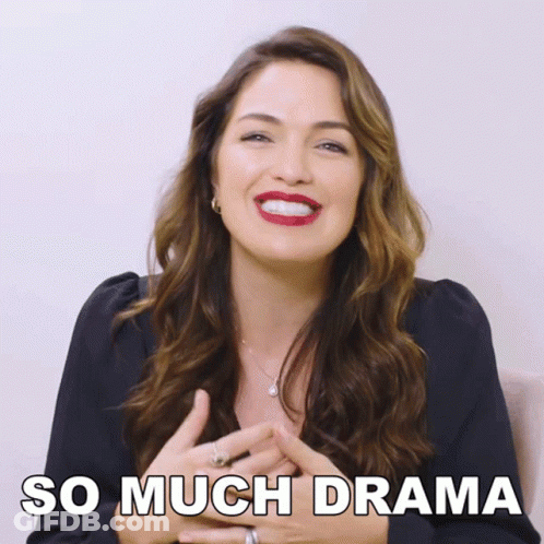 A Woman Is Smiling With The Words So Much Drama Written Below Her GIF