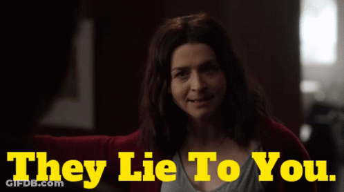 A Woman Is Smiling With The Words They Lie To You Below Her GIF