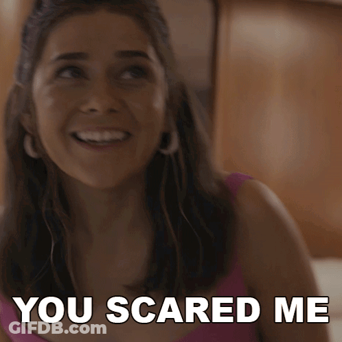 A Woman Is Smiling With The Words You Scared Me Written Below Her GIF