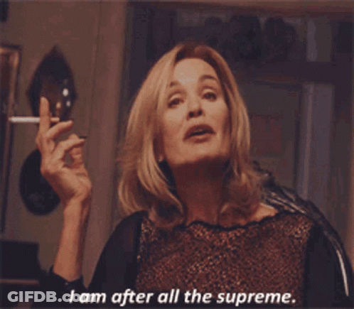 A Woman Is Smoking A Cigarette And Says I Am After All The Supreme GIF