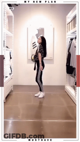 A Woman Is Standing In A Closet With The Words My New Plan Must Have On The Bottom GIF