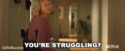 A Woman Is Standing In A Hallway And Says You 'Re Struggling GIF
