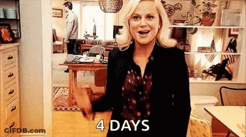A Woman Is Standing In A Living Room With Her Hands In The Air And The Words `` 4 Days '' Written On Her Face . GIF