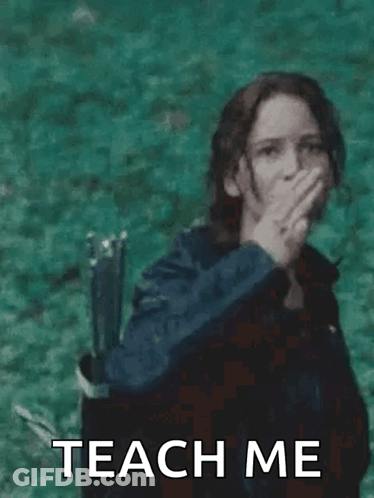 A Woman Is Standing In Front Of A Body Of Water Giving The Middle Finger . GIF