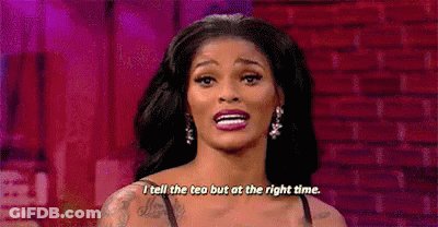 A Woman Is Standing In Front Of A Brick Wall And Saying `` I Tell The Tea But At The Right Time '' . GIF