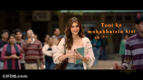 A Woman Is Standing In Front Of A Crowd With The Words " Toot Ke Mohabbatein Kisi Se " GIF
