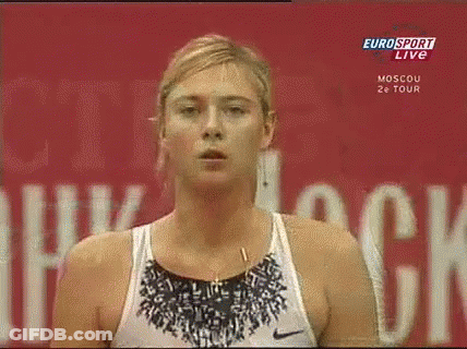 A Woman Is Standing In Front Of A Eurosport Live Sign GIF