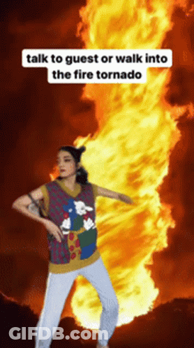 A Woman Is Standing In Front Of A Fire Tornado With The Words Talk To Guest Or Walk Into The Fire Tornado Above Her GIF