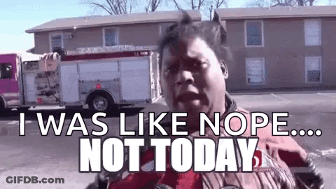 A Woman Is Standing In Front Of A Fire Truck With The Words `` I Was Like Nope ... Not Today '' Written On It . GIF
