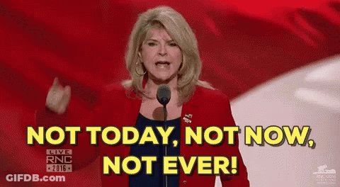A Woman Is Standing In Front Of A Microphone And Saying `` Not Today , Not Now , Not Ever '' . GIF