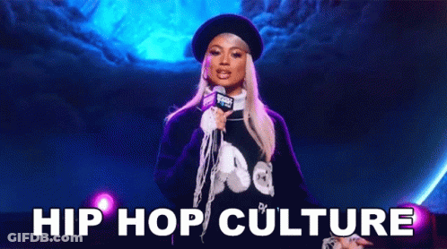 A Woman Is Standing In Front Of A Microphone Holding A Microphone . GIF
