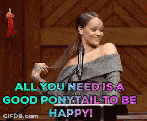 A Woman Is Standing In Front Of A Microphone With The Words " All You Need Is A Good Ponytail To Be Happy " GIF