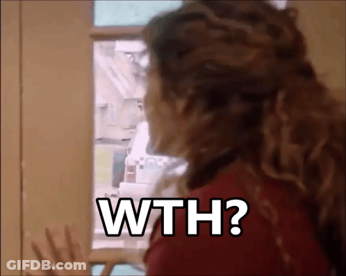 A Woman Is Standing In Front Of A Refrigerator Door And Asking Why ? GIF