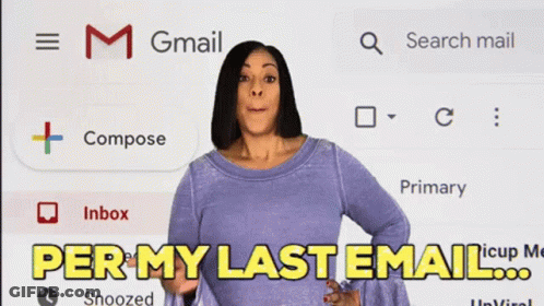 A Woman Is Standing In Front Of A Screen That Says Gmail On It GIF