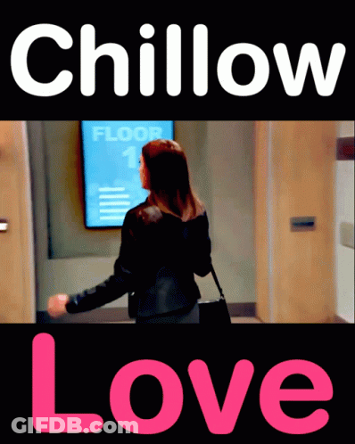 A Woman Is Standing In Front Of A Sign That Says Floor 1 On It GIF